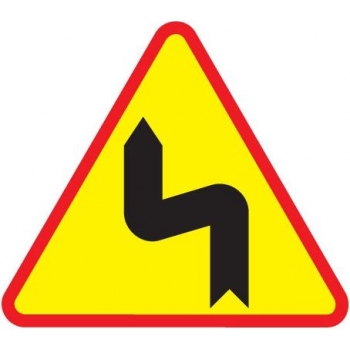 Znak drogowy ostrzegawczy A-4 dwa niebezpieczne zakręty - pierwszy w lewo